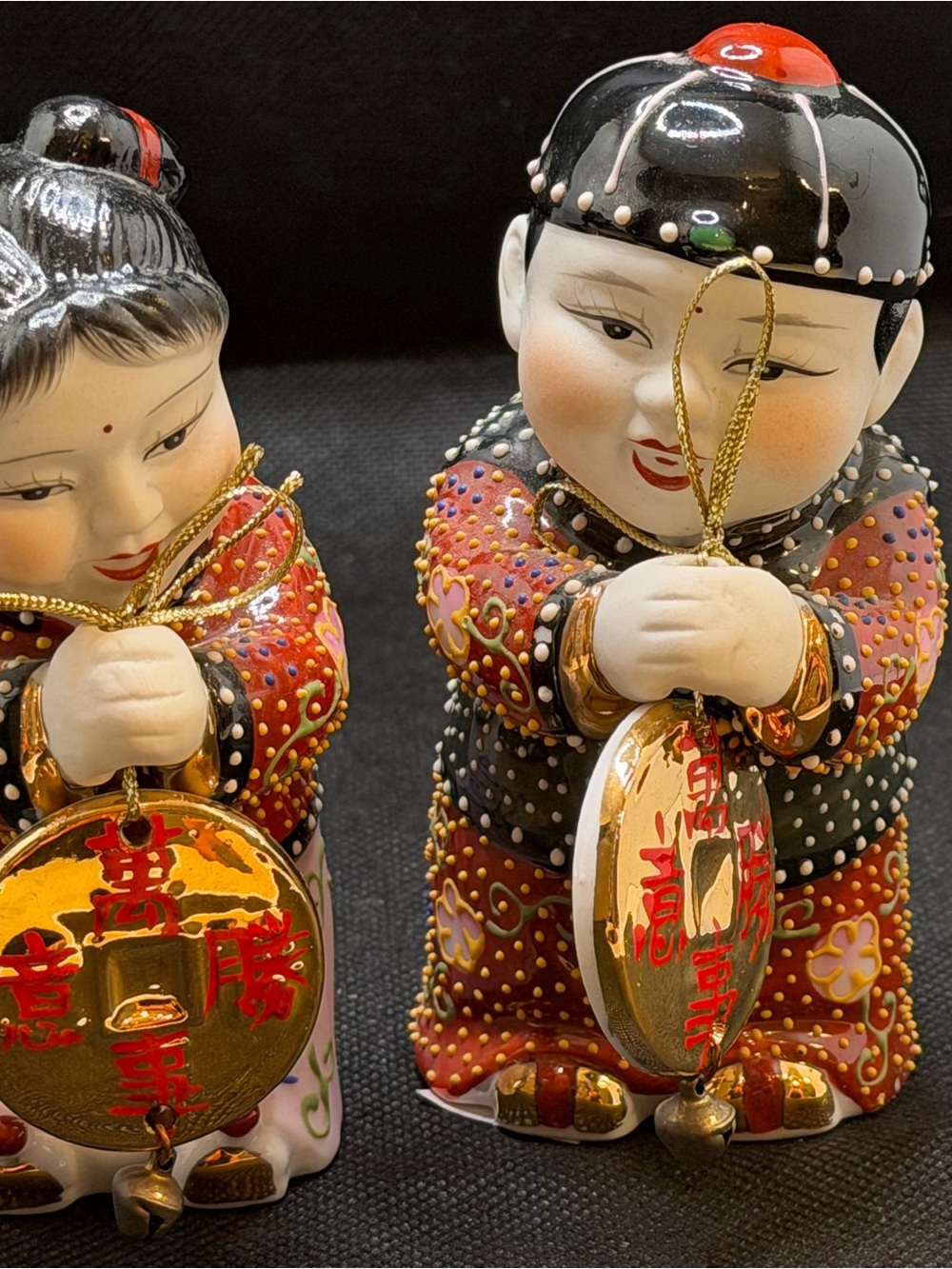 Pair of Ceramic Asian Blessing Figurines with Gold Coins - Red, Black, Gold